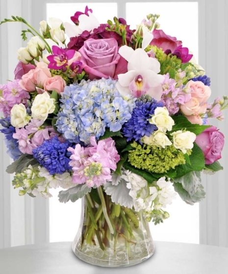 Purple Roses, Baby Blue Hydrangea, White Stock, Purple Hyacinths